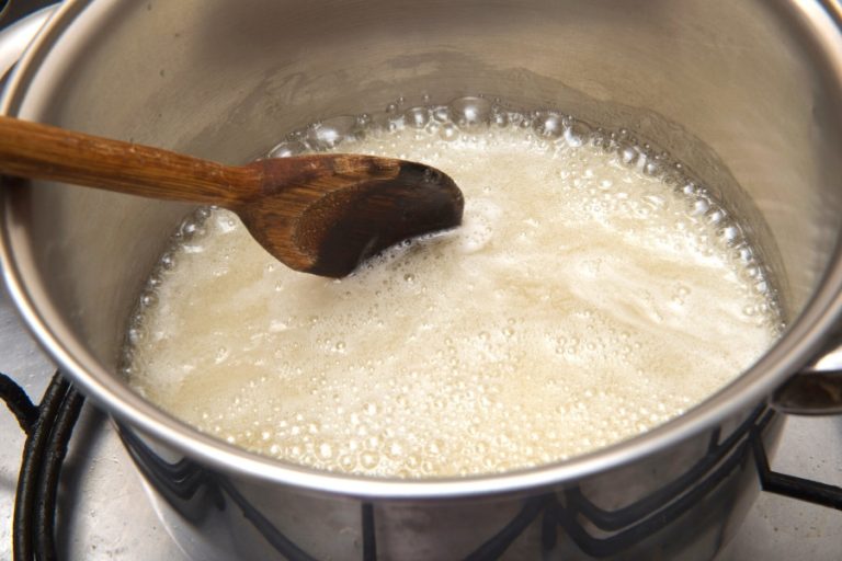 A simple sugar syrup boiling in a pan