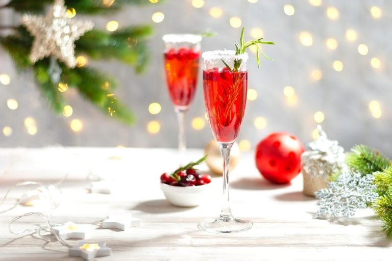 sparkling cranberry mimosa glasses with a christmas table setting