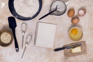 a flat lay of tools you need for baking in the kitchen
