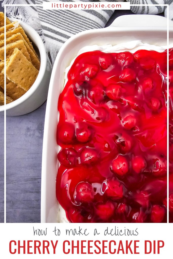 a large dish of cherry cheesecake dip with dipping wafers