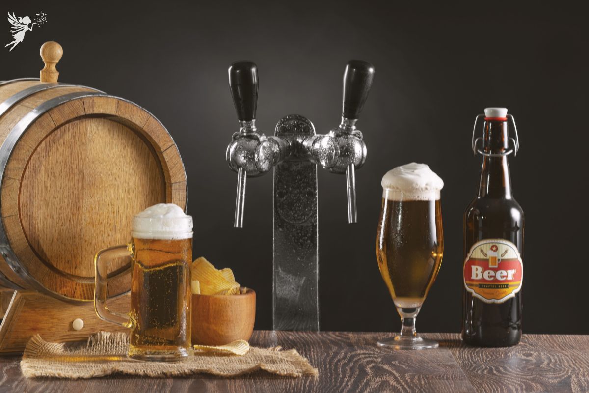 Two frothy beers, wooden barrel, tap, and bottle on table