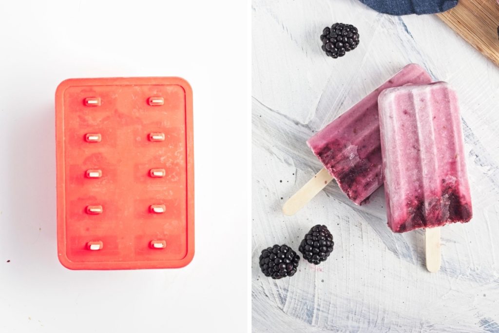 final stage of making blackberry popsicles before popping out of mold and showing what a completed popsicles looks like, artistically shown on a white painted wood background