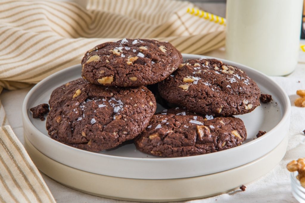 Process image for making brownie cookies - finish results with brownie cookies served on a white round platter