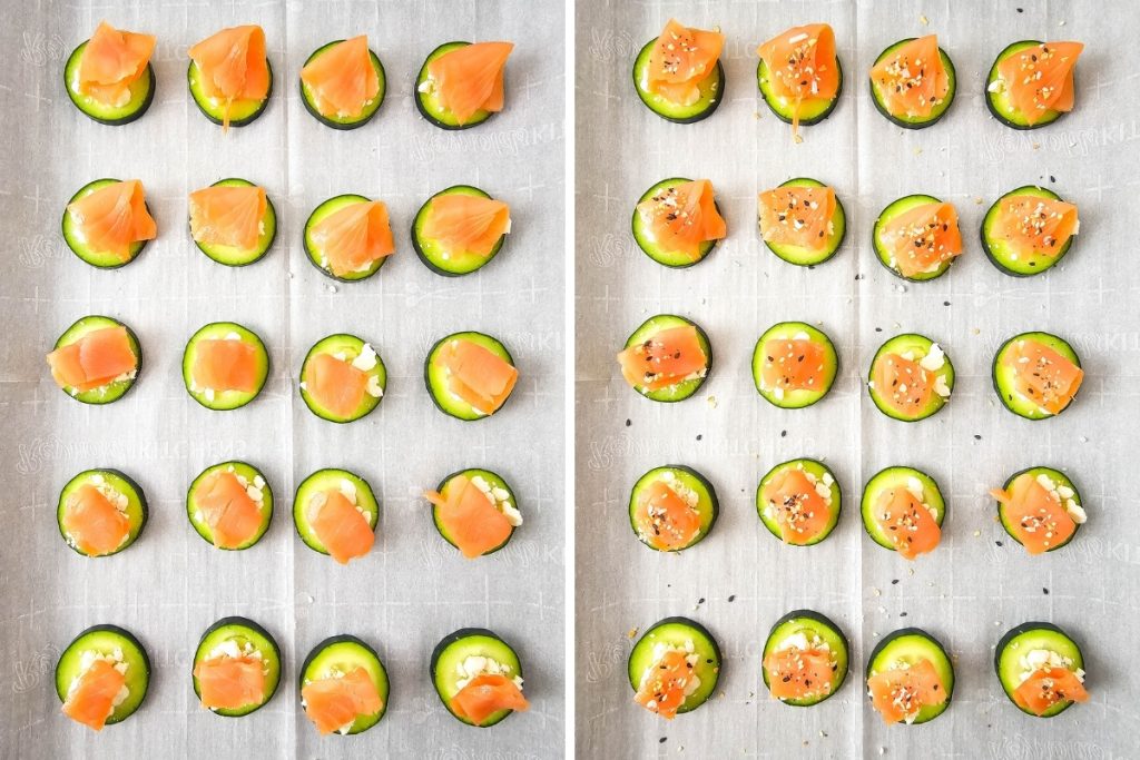Process image for making salmon cucumber bites - add a piece of smoked salmon on top of feta cheese then sprinkle with seasoning