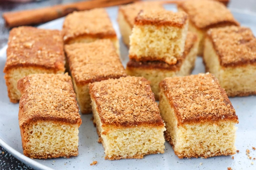 slices of snickerdoodle bar on a white plate