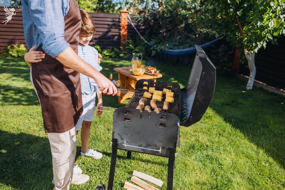 dad grilling with son