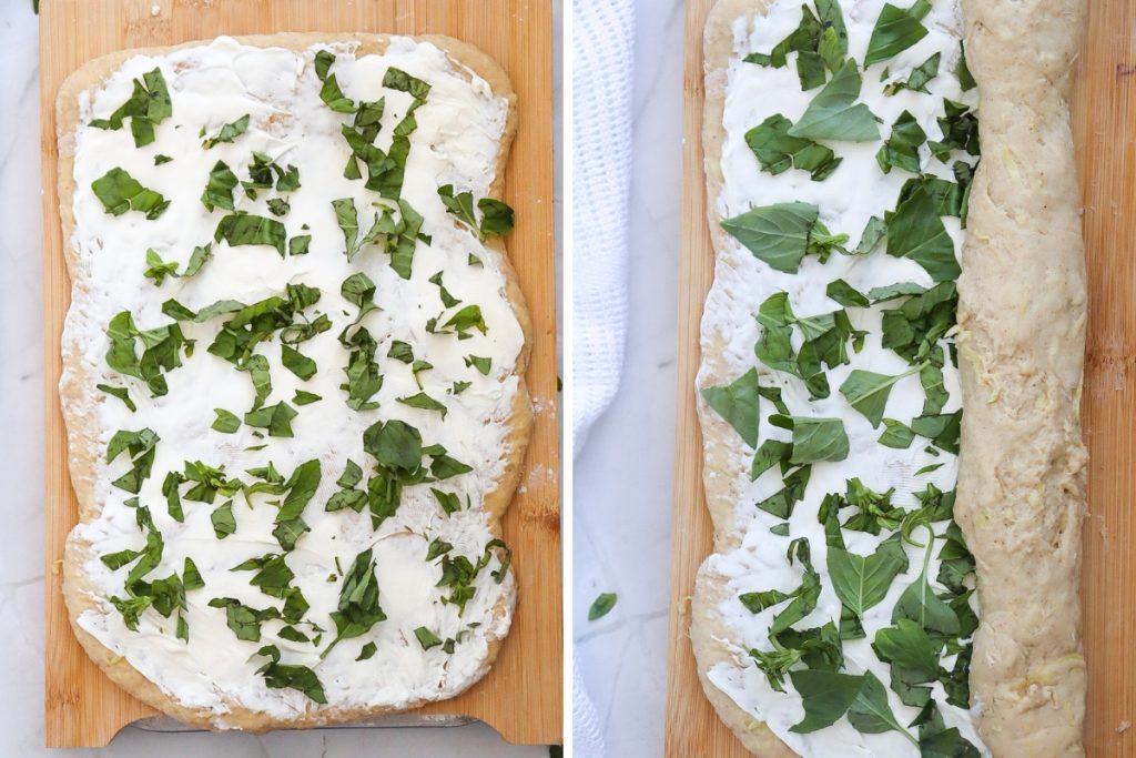 Process image for making Zucchini Bread - Spreading half of the cream cheese and basil filling evenly then rolling the dough