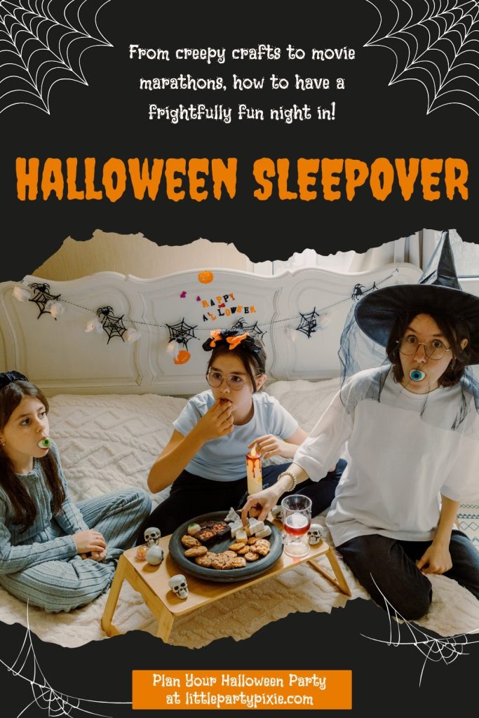 kids on a bed eating halloween treats for a halloween sleepover party