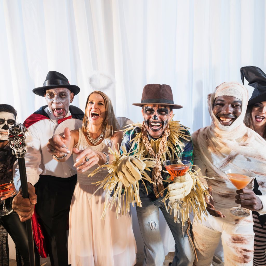 adult wearing a variety of halloween costumes with pretend terrified faces