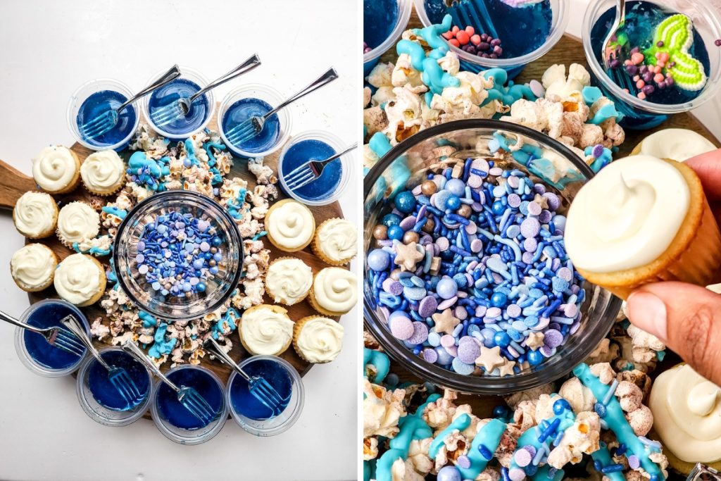 Process image for making Under the Sea Charcuterie - finished Under the sea theme charcuterie board with mini cupcake about to be dip into the blue sprinkles