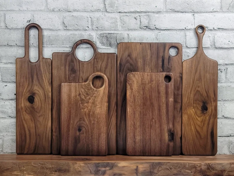 wooden charcuterie baords in a display etsy seller WoodandBoard