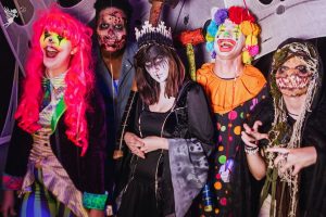 Teenagers dressed in scary halloween costumes