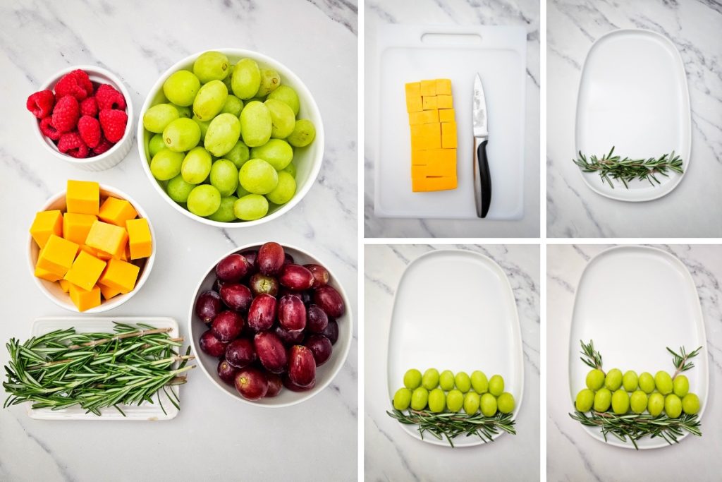 Ingredients and process image for making Holiday Tree Fruit Platter - cut cheese into cubes, started arranging sprigs of rosemary and green grapes for first few bottom layers