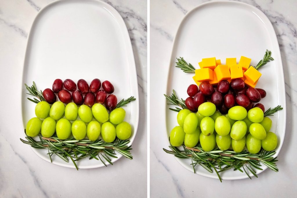 Process image for making Holiday Tree Fruit Platter - add 2 rows of red grapes and 2 sprigs of rosemary