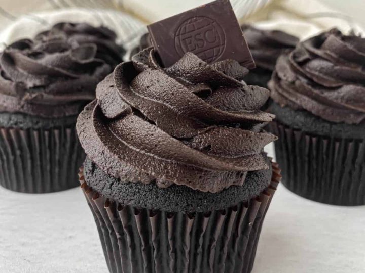 Black velvet cupcakes with chocolate frosting and mini chocolate bar topping