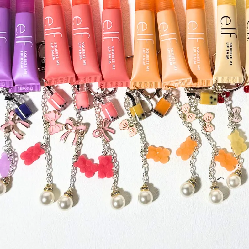 rainbow of color elf lip balms on keychains gifts etsy
