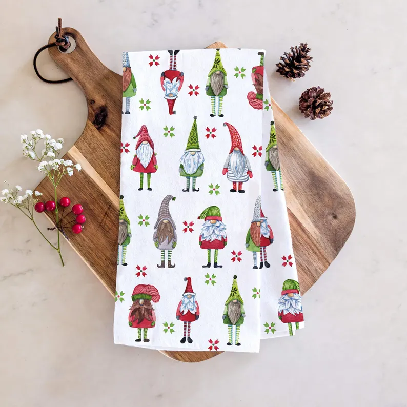 festive gnome tea towel flat lay display over kitchen board etsy