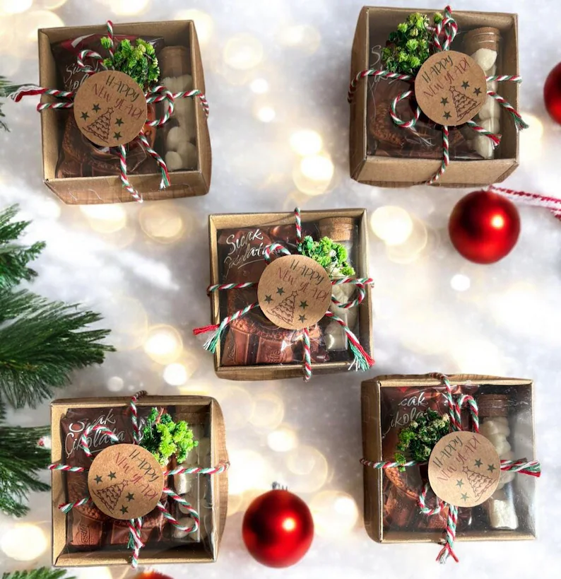boxes of cocoa gift sets on white flatlay etsy