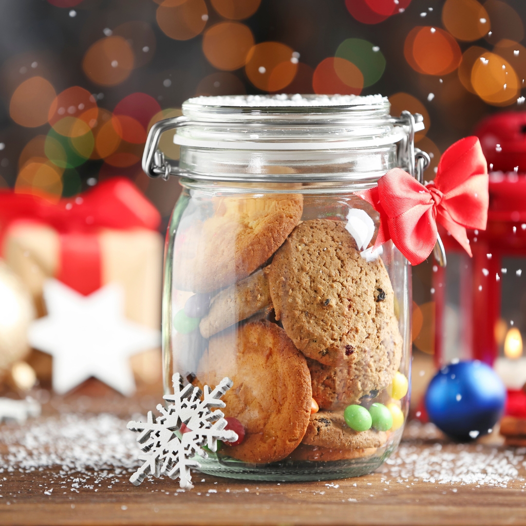jar of Christmas cookies with gift bow