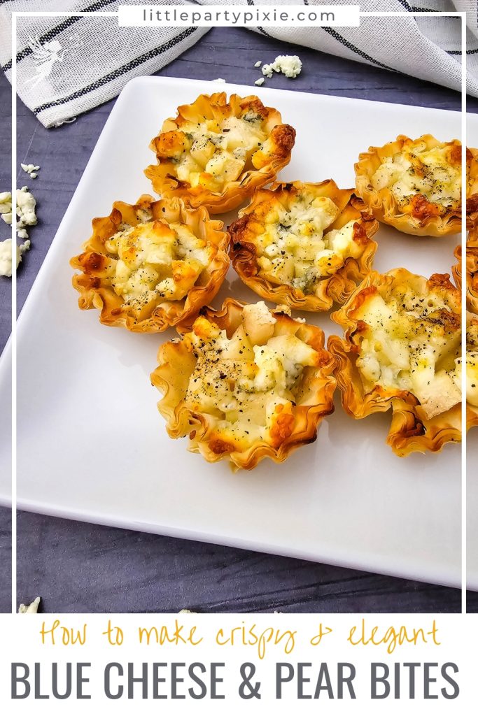 Close-up of crispy Blue Cheese & Pear Phyllo Bites on a white plate, showing the golden pastry.