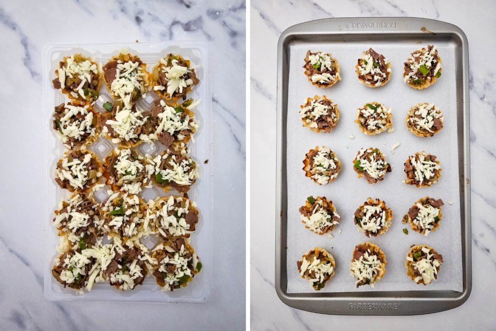 Assembled Philly Cheesesteak Phyllo Bites topped with shredded cheese, ready for the oven on a baking sheet and in a plastic tray.