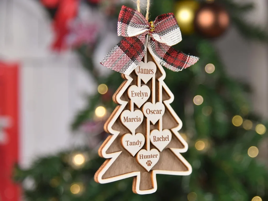 a christmas tree ornament with family member names inside on love hearts etsy gift