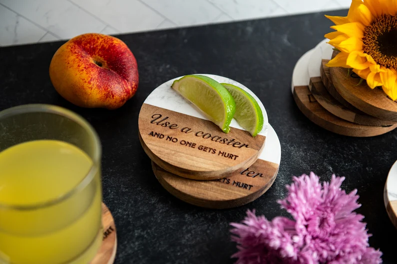 a wood and marble drink coaster with lime slices etsy