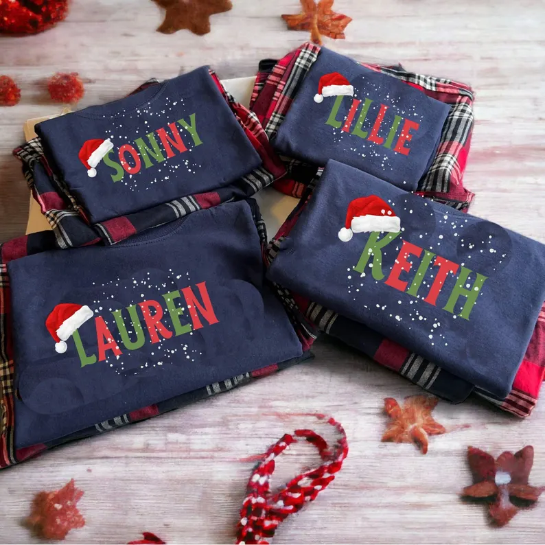 matching pajama family set long sleeve tops with personalized names and plaid pants on etsy