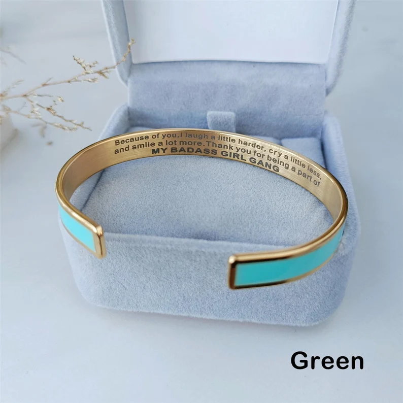 A gold and teal enamel cuff bangle engraved with a motivational "Badass Girl Gang" message, a fashionable Teen Party Favor. Etsy