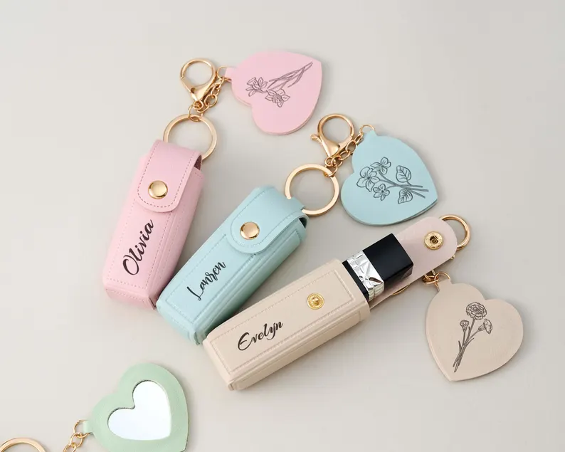 Three personalized lipstick keychain cases in pastel colors, with matching heart-shaped mirror tags, stylish Teen Party Favors. Etsy