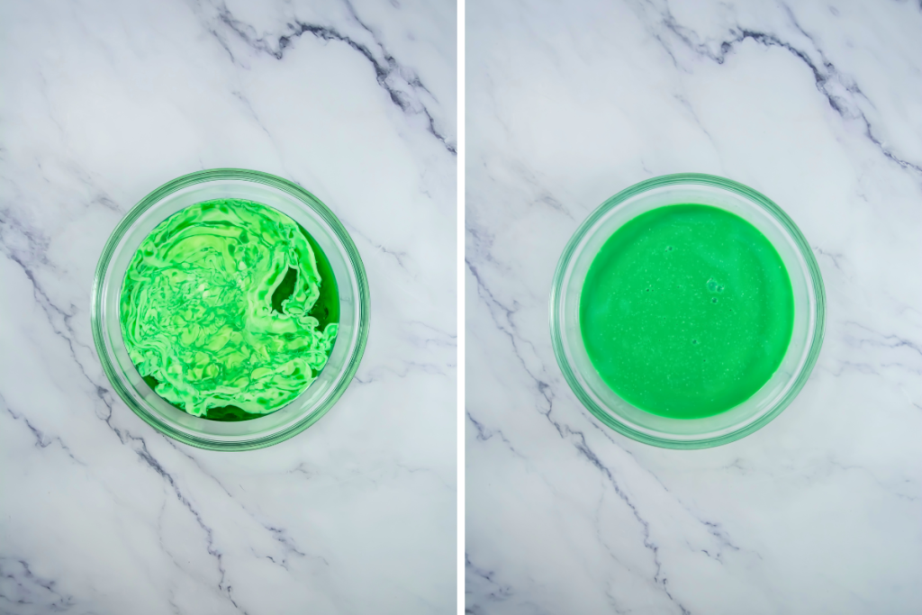 The mixing process begins by combining cream and green syrup to achieve the vibrant color base of the Baileys Mint Cocktail.