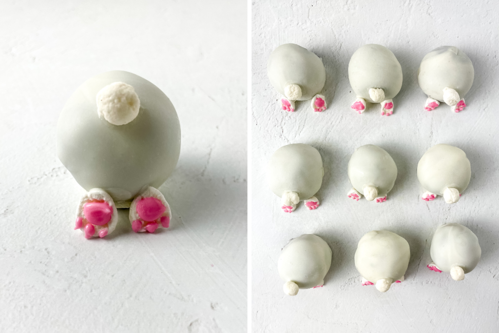 The finished Bunny Butt Truffles displayed, showing the white truffle body, small tail, and pink-padded feet attached.