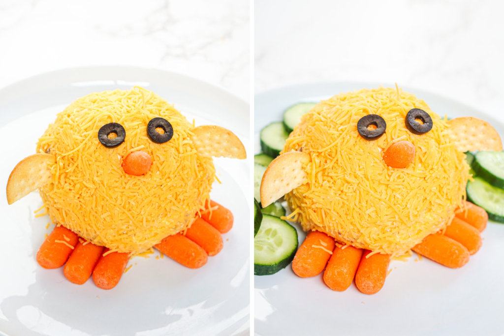 The finished Easter Chick Cheese Ball is decorated with cracker wings and baby carrot feet, served with sliced cucumbers.