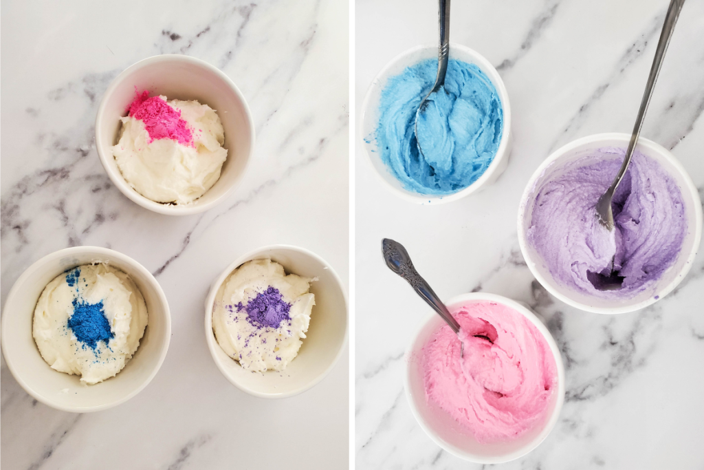 The whipped sugar scrub base is divided into bowls, and pink, blue, and purple mica powders are added and stirred to create the colored layers for Whipped Rainbow Sugar Scrub.