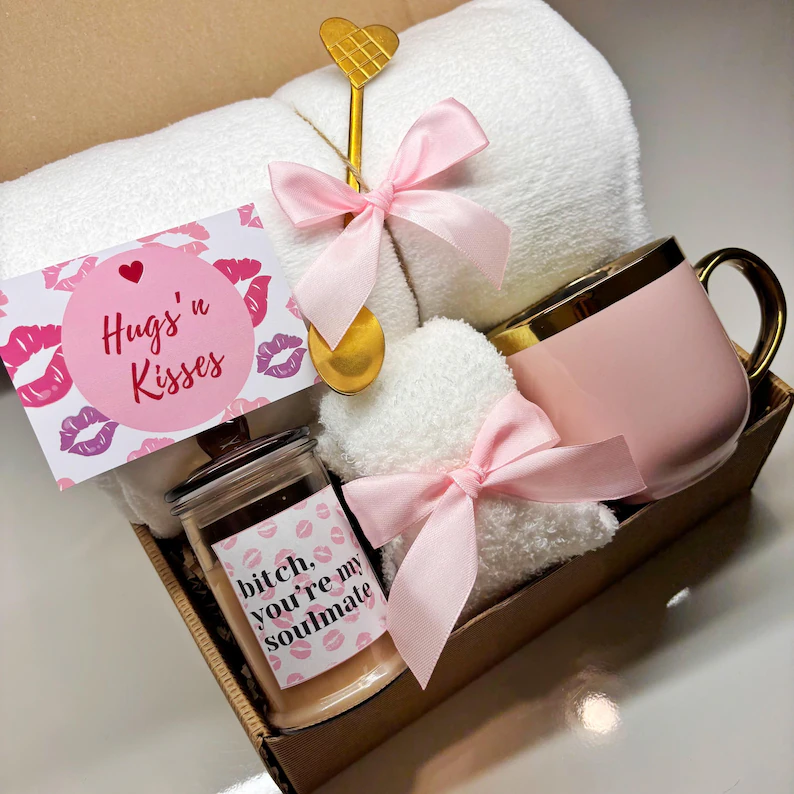 Fun and cozy Galentine's Day Gift self-care kit including a coffee mug, fuzzy heart, towel, and humorous candle. Etsy