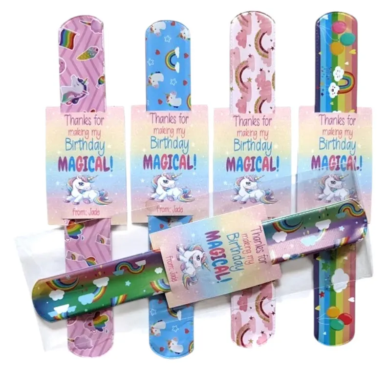 Five colorful unicorn-themed slap bracelets with "Thanks for making my Birthday Magical!" tags, perfect Unicorn Party Favors. Etsy