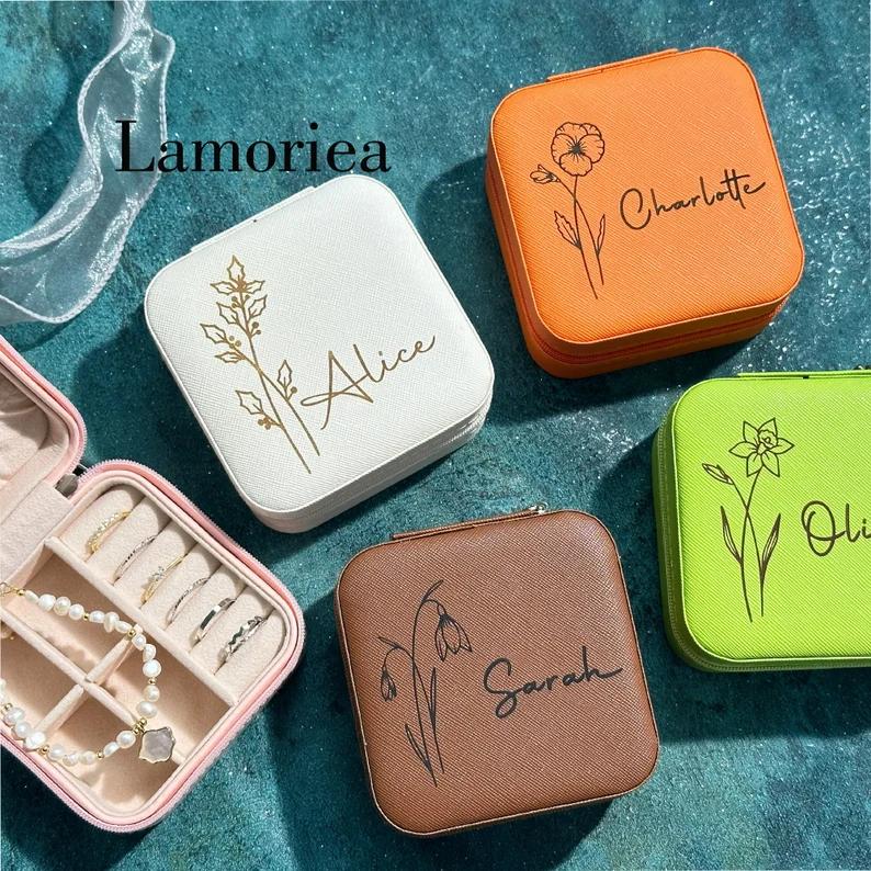 Personalized travel jewelry cases featuring botanical sketches, a thoughtful choice for custom birth month gifts for her.