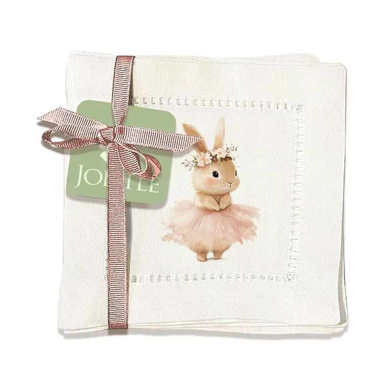 Elegant white hemstitch napkins featuring a bunny in a tutu, perfect as a charming Easter Hostess Gift.