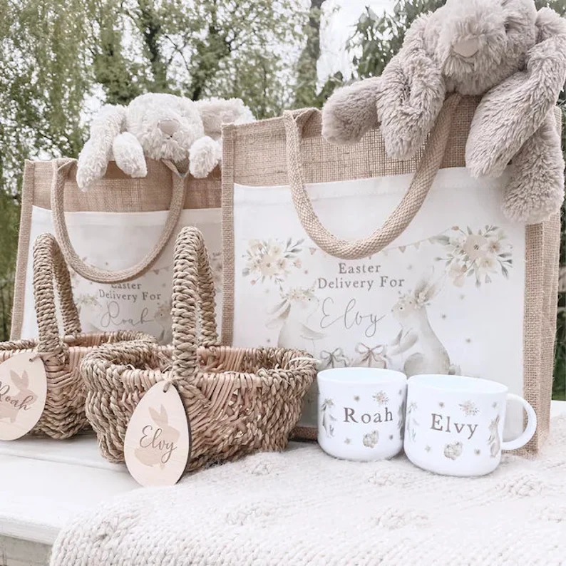 Personalized burlap delivery bags and matching white mugs with bunny motifs, a complete Easter Hostess Gift set.