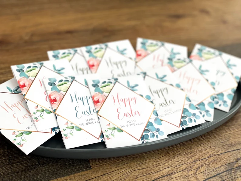 Floral seed packets with "Happy Easter" branding, offering a unique and sustainable gardening gift idea for DIY Adult Easter Baskets.