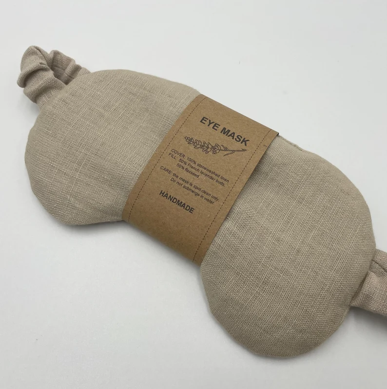 Weighted linen eye mask filled with lavender and flaxseed, a luxury relaxation gift for spa-themed Adult Easter Baskets.