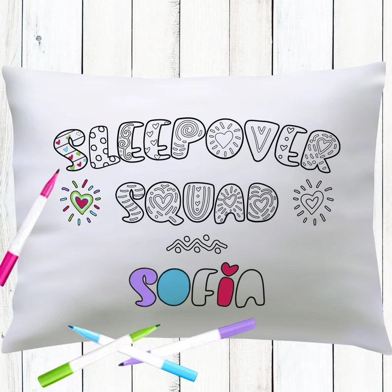 A "Sleepover Squad" pillowcase designed for coloring with markers, featuring a personalized name, perfect for creative sleepover party favors. Etsy