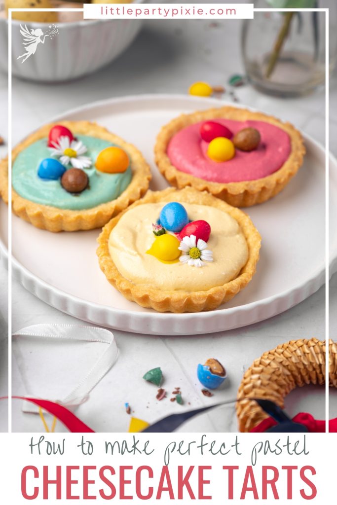 Delicious mini Easter Cheesecake Tarts with colorful candy toppings, a top-rated spring dessert idea and simple no-bake treat for Easter Sunday brunch.
