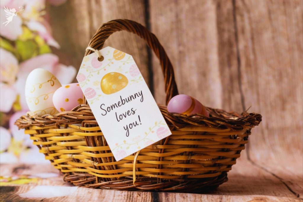 a small woven basket with a few floral eggs and a tag that says Somebunny loves you