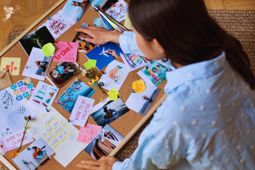 girl creating a vision board