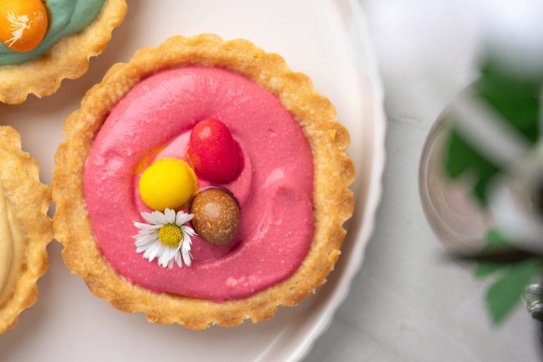 Easter Cheesecake Tarts featuring a buttery graham cracker crust and creamy vanilla filling for holiday baking at home.