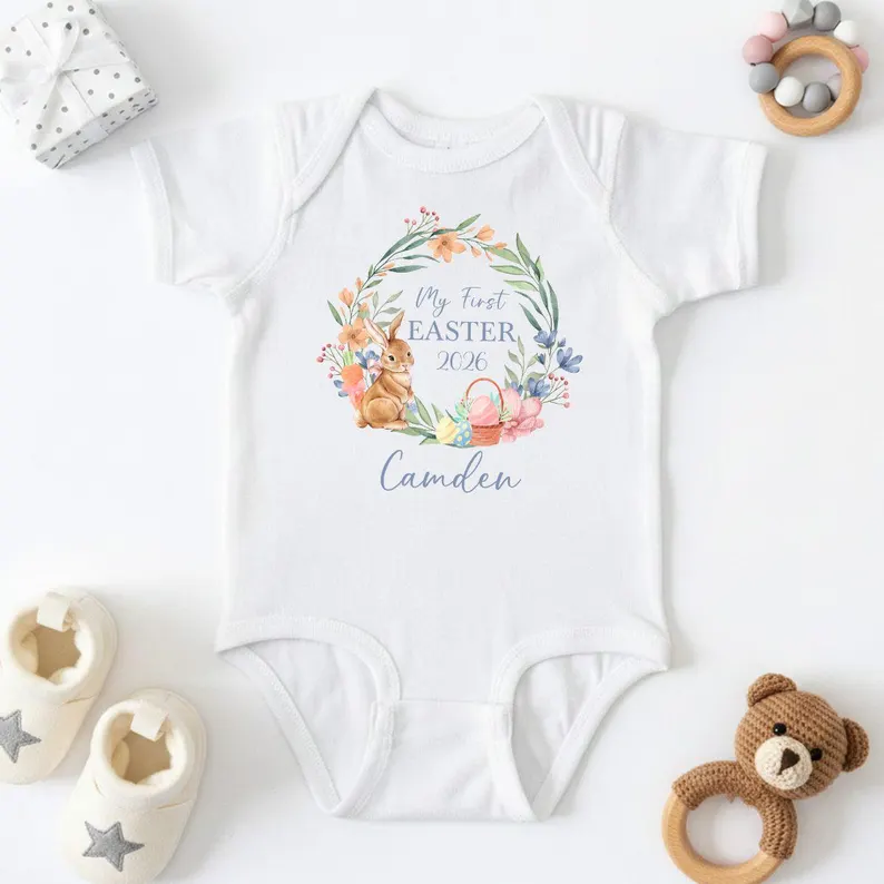 White my first Easter bodysuit personalized with name Camden, featuring watercolor bunny wreath design, perfect for baby Easter basket. Etsy