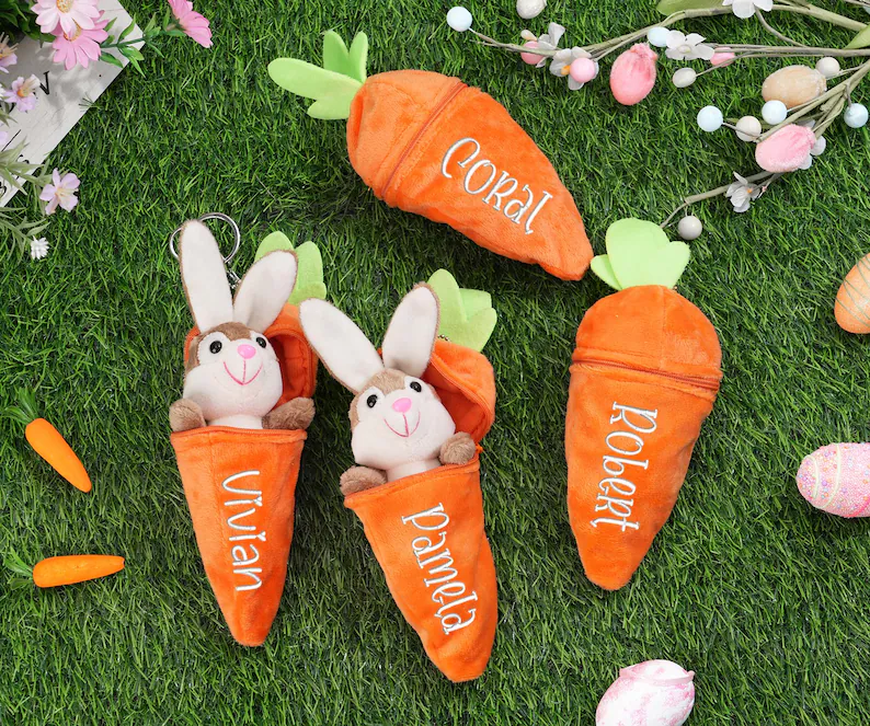 Personalized orange plush carrot keychains with bunny toys inside, embroidered with custom names, adorable addition to baby Easter basket.