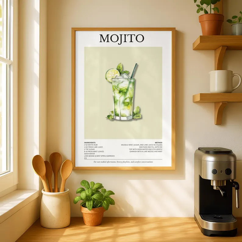 Framed mojito cocktail recipe print with watercolor illustration and ingredients list in wood frame on sunny kitchen counter—elegant mojito lovers gift ideas. Etsy