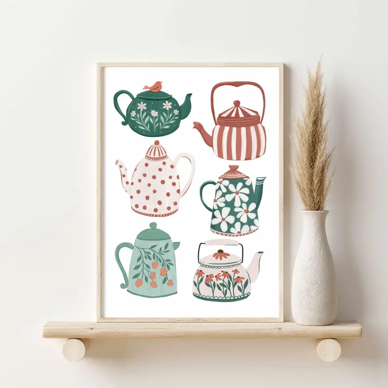 Vintage teapot wall art print featuring six illustrated teapots with floral, polka dot, and striped patterns in wood frame—charming tea lovers gift ideas. Etsy